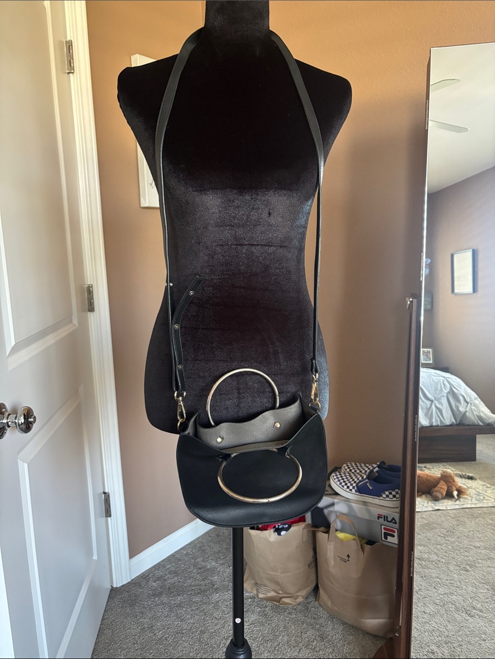Black Leather Crossbody Bag with Gold Ring Accent